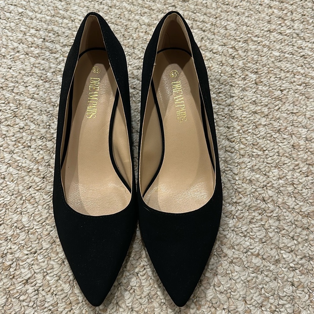 Black pointed toe heels, size 8.5